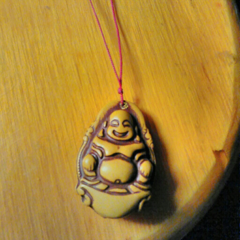 Carved buddah necklace